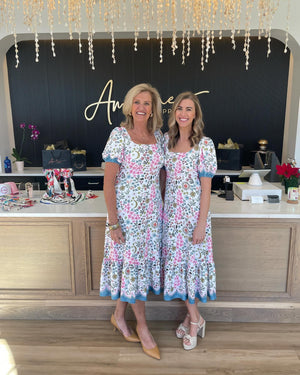 2 women at ameline shoppe in crabapple alpharetta ga wearing easter dresses